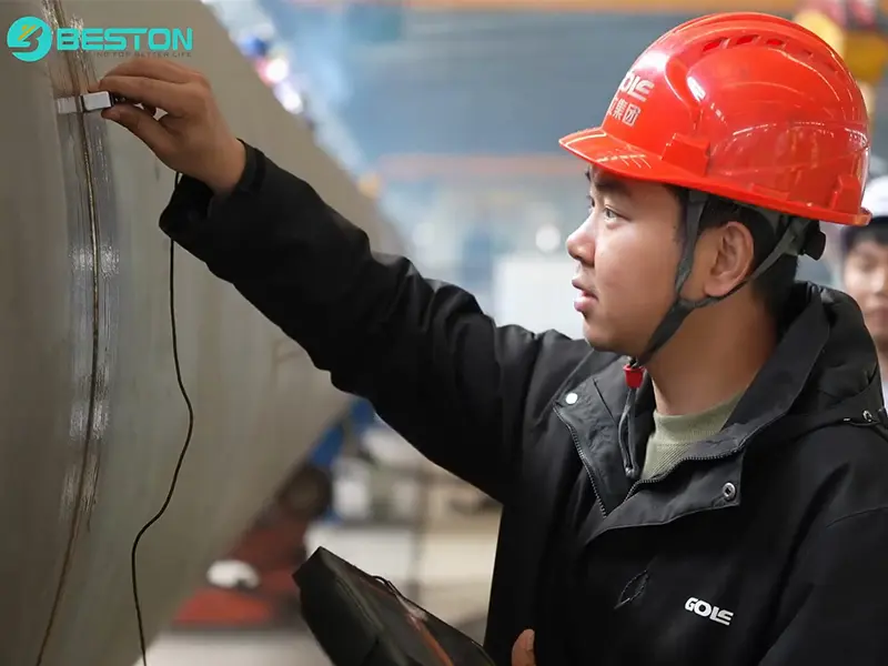 Engineer Performing Ultrasonic Flaw Detection on Thermal Desorption Reactor