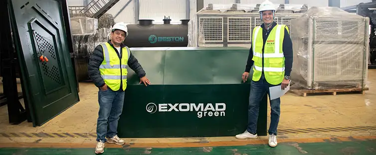 Exomad-Green-Team-Poses-with-Equipment-Components